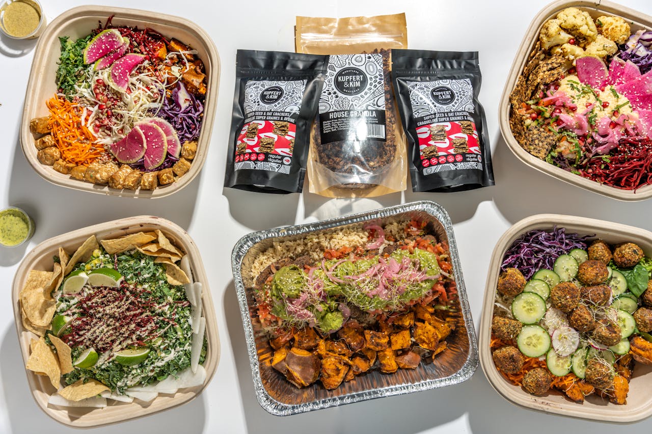 A vibrant display of diverse vegetarian dishes featuring fresh, wholesome ingredients and healthy granola.